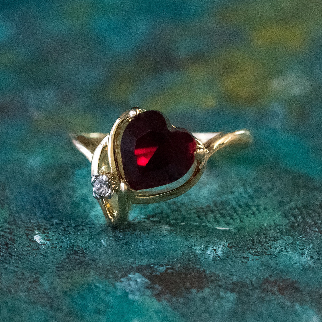 Heart shaped ruby on sale ring yellow gold